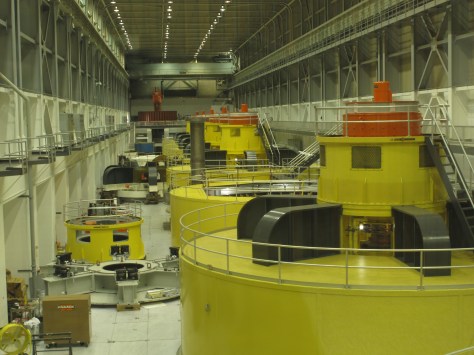 Generators inside Glen Canyon Dam. You can see one that is disassembled for maintenance work.